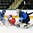 GRAND FORKS, NORTH DAKOTA - APRIL 21: Finland's Ukko-Pekka Luukkonen #1 looks to make the save while teammate Henri Jokiharju #28 gets tangled up with Russia's Klim Kostin #24 during quarterfinal round action at the 2016 IIHF Ice Hockey U18 World Championship. (Photo by Minas Panagiotakis/HHOF-IIHF Images)

